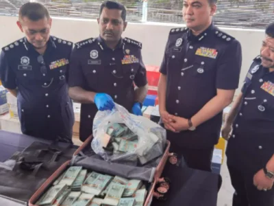 谁在停车场丢了50万现金? 大马警方呼吁尽快来认领!