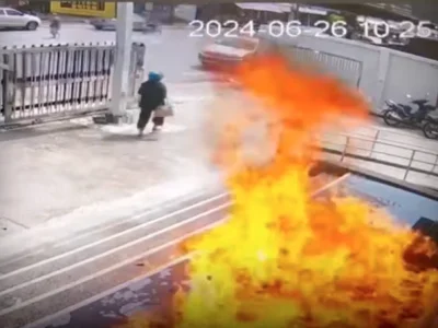 妇人泼汽油纵火烧银行 监控全拍下