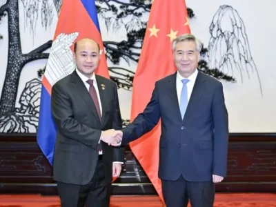 洪玛尼在北京拜会中共中央纪委书记李希