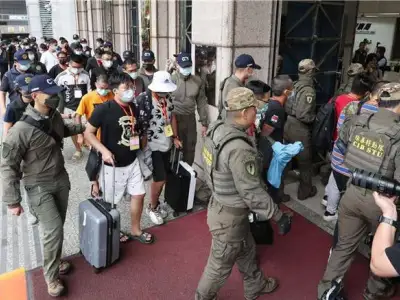 55名台湾诈骗犯被当局接回，其中25人是通缉犯