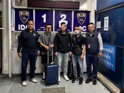 3名中国男子机场落网，全身藏19部手机