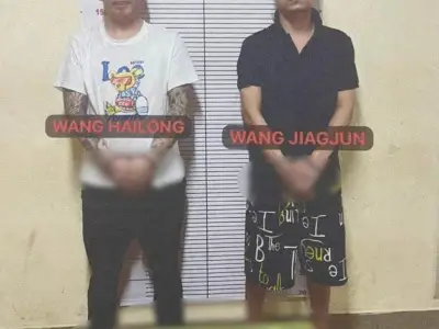 西港两中国男子非法持枪被捕