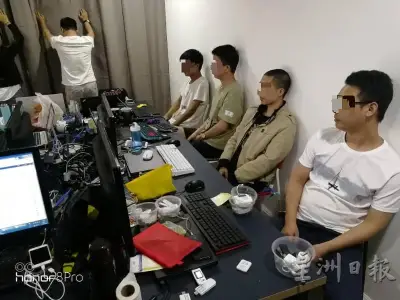 马来西亚警方捣毁一诈骗集团，抓23中国男女
