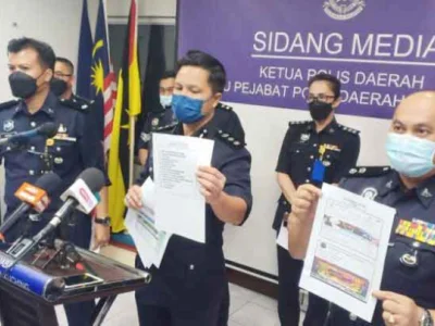 马来西亚古晋警方5天内捣毁3个网络赌博集团呼叫中心，22名“菜农”落网