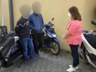 为满足家庭需求 菲律宾摩托车骑手被逼“下海”提供额外服务