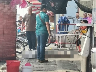 与人发生口角，大马华裔路边摊小贩被木棍当街打死