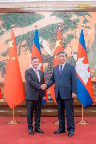 洪玛耐首相会见习近平主席