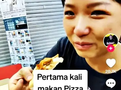中国籍女大学生第一次在大马吃到披萨，她哭了......